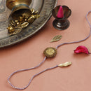 Brass Rakhi For Bhaiya | Auric Charm | Purple & Green | Set of 2