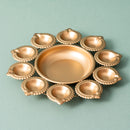 Brass Lotus Urli with Diyas | Gold Finish