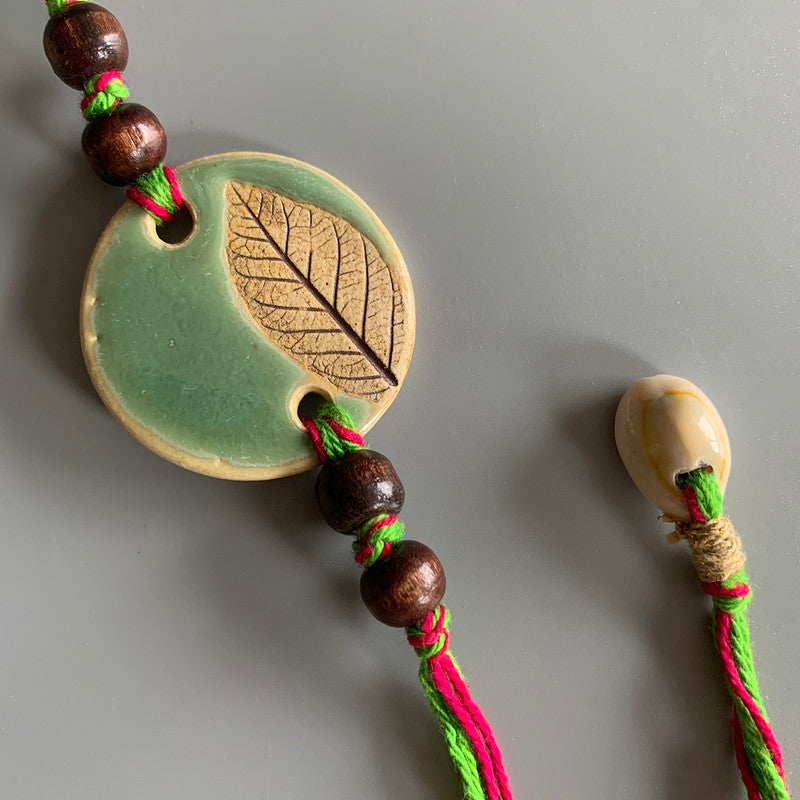 Rakhi For Bhaiya | Ceramic, Cotton Threads | Green & Red