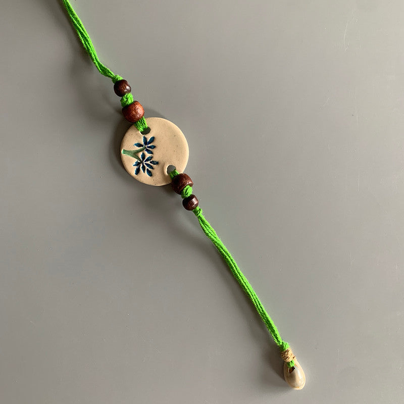 Rakhi For Bhai | Ceramic, Cotton Threads | White & Green
