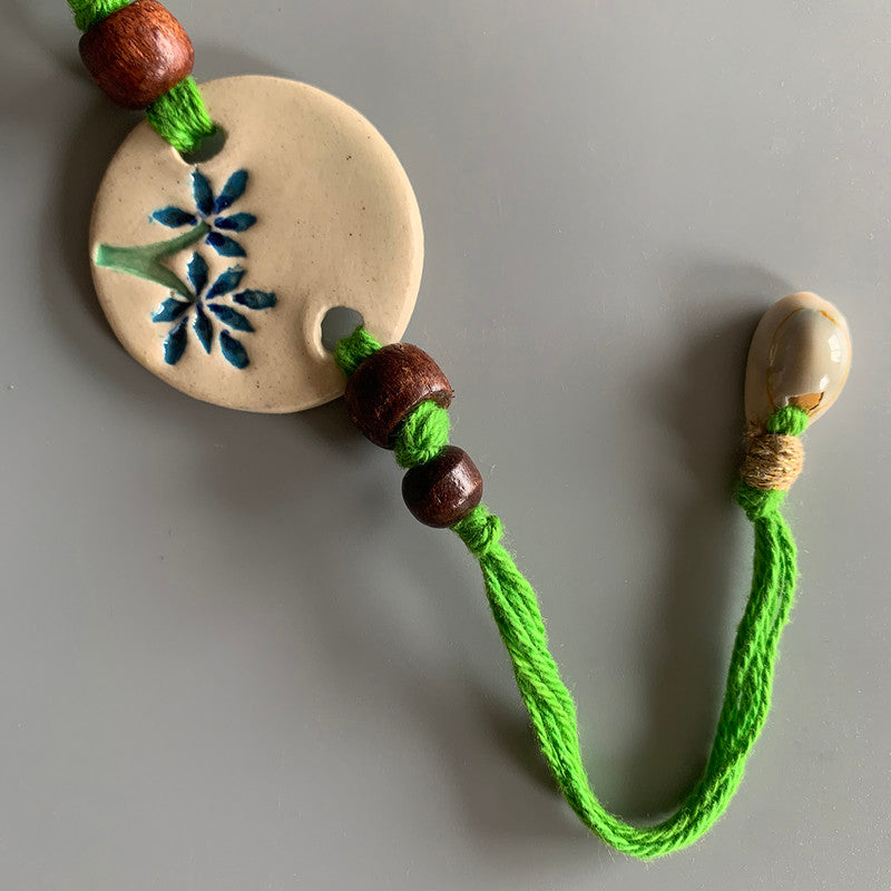 Rakhi For Bhai | Ceramic, Cotton Threads | White & Green